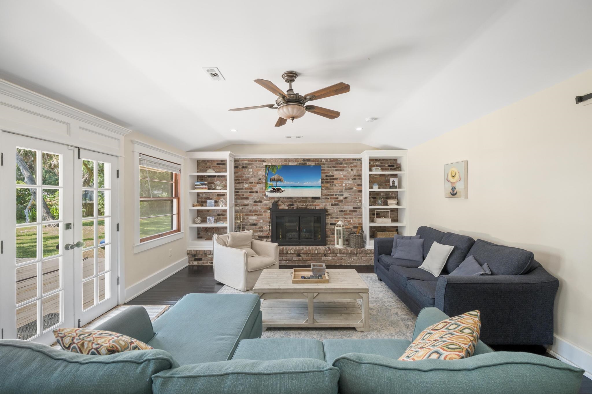 9 Menendez Road St. Augustine, FL 32080 - Photo 12 of 43 a living room with furniture and a large window