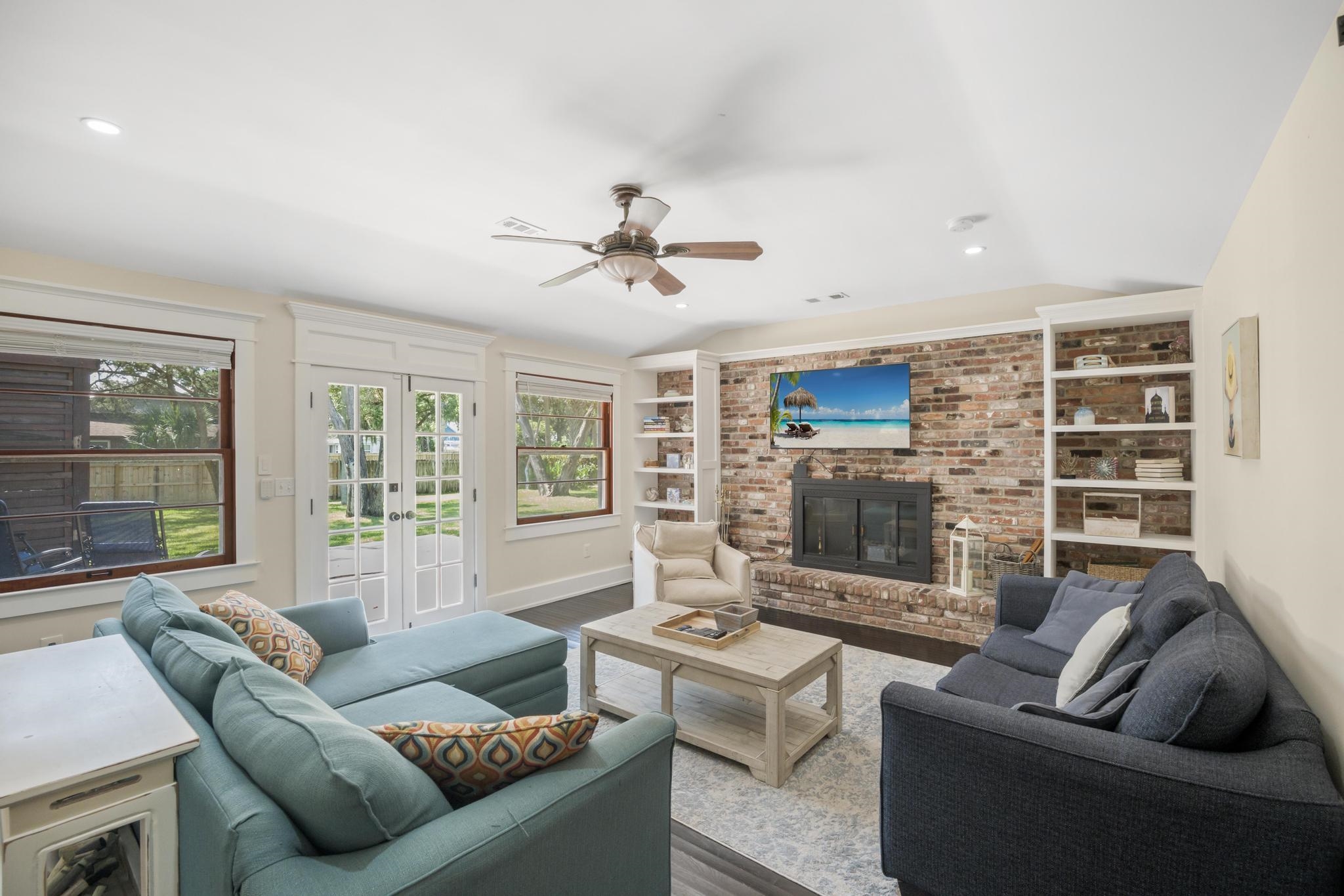 9 Menendez Road St. Augustine, FL 32080 - Photo 13 of 43 a living room with furniture and a large window