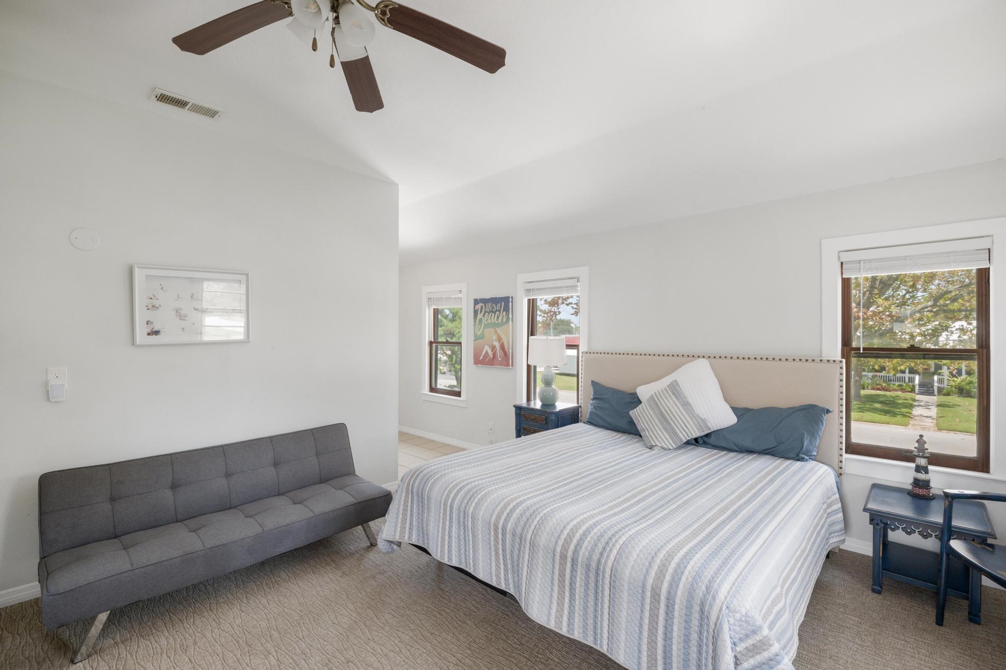 9 Menendez Road St. Augustine, FL 32080 - Photo 20 of 43 a bedroom with bed and a couch