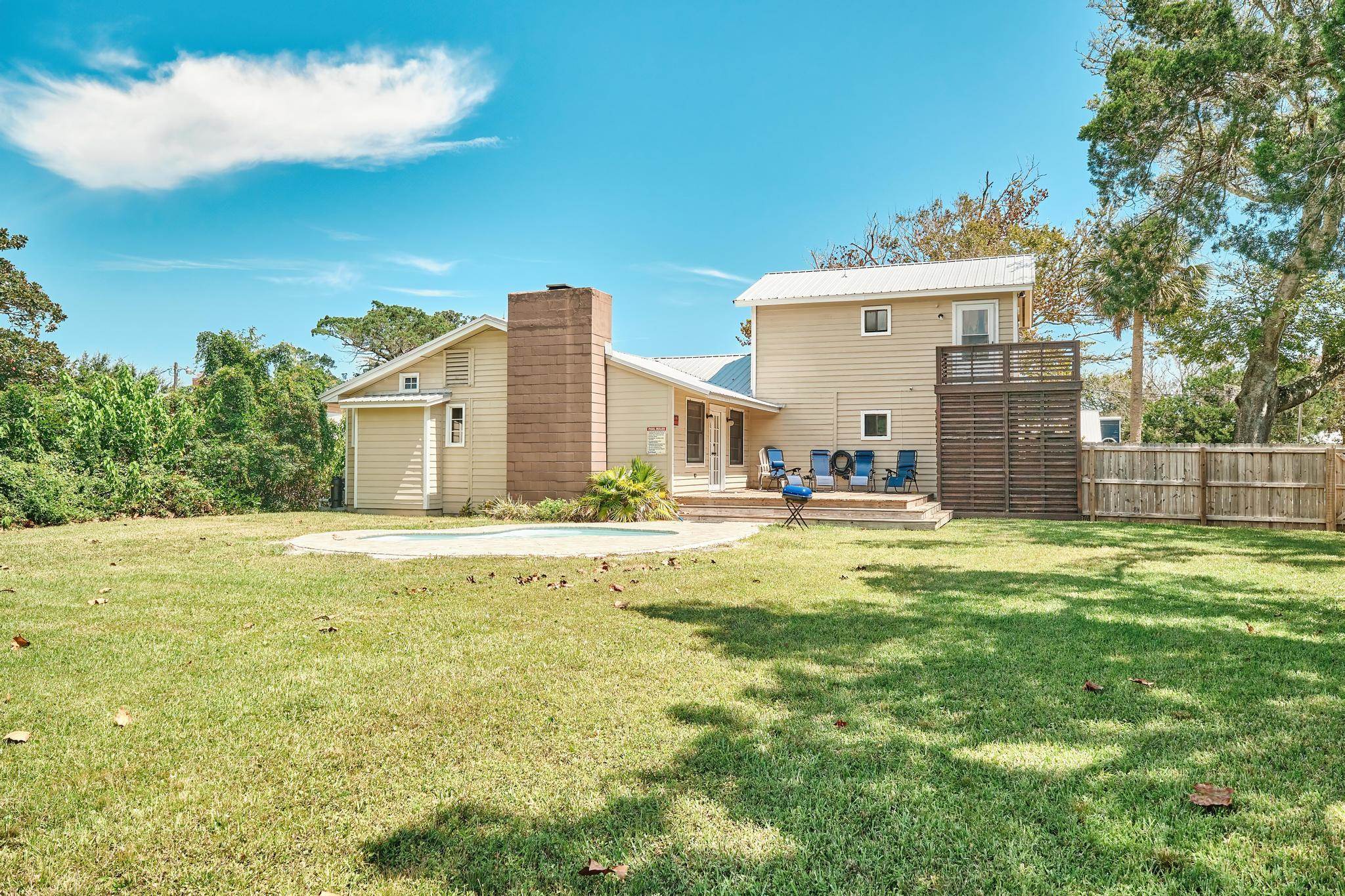 9 Menendez Road St. Augustine, FL 32080 - Photo 3 of 43 a swimming pool view with a outdoor space