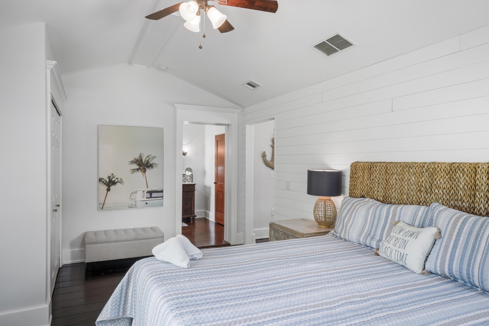 9 Menendez Road St. Augustine, FL 32080 - Photo 33 of 43 a bedroom with a bed and a chandelier