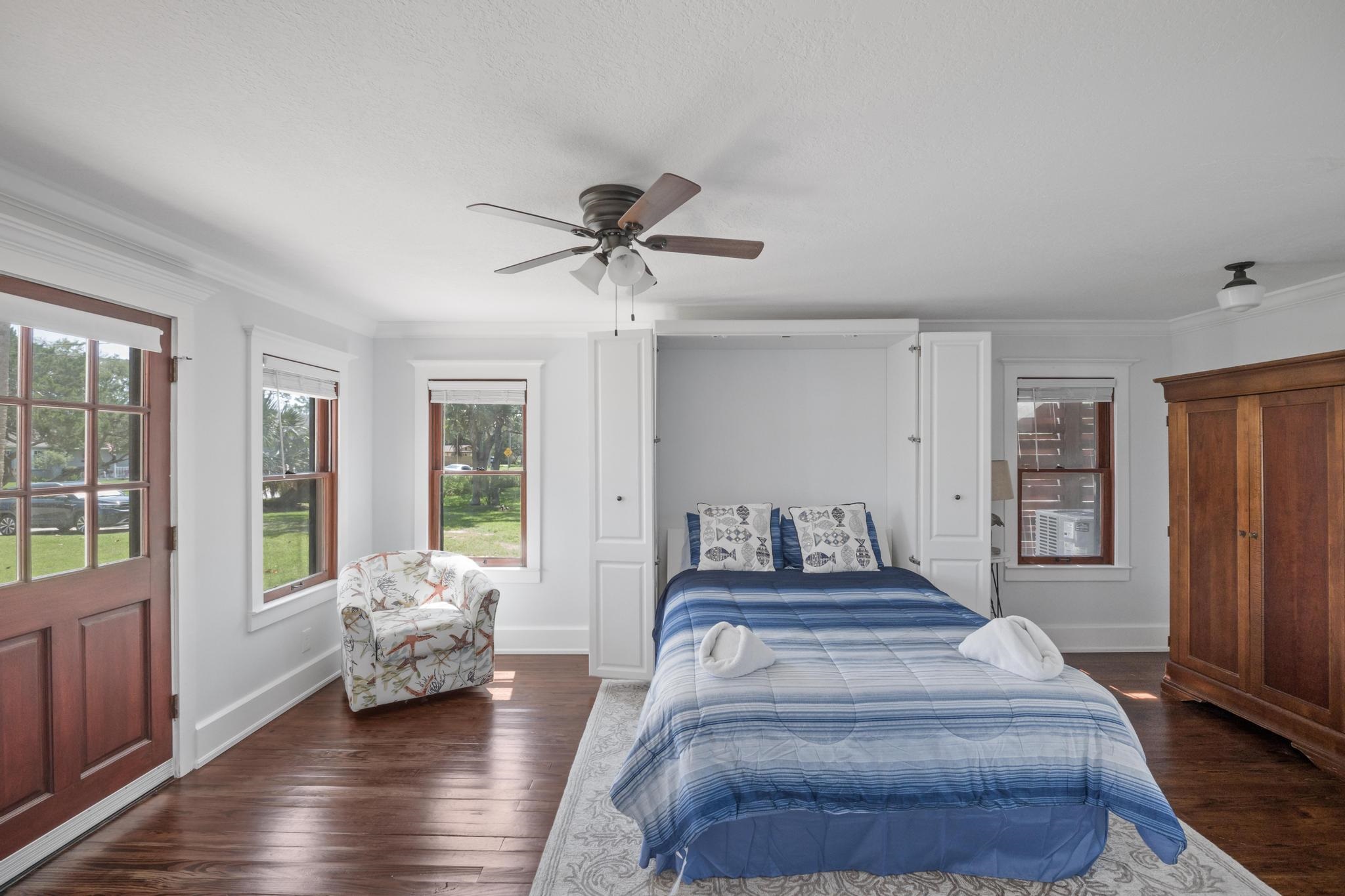 9 Menendez Road St. Augustine, FL 32080 - Photo 43 of 43 a spacious bedroom with a large bed and a couch