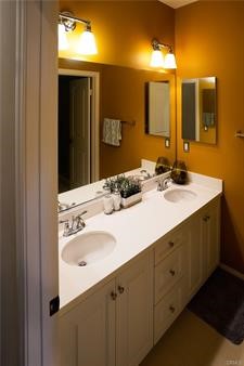 2963 Walking Beam Place Brea, CA 92821 - Photo 11 of 25 a bathroom with a sink and a mirror