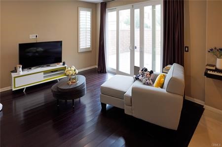 2963 Walking Beam Place Brea, CA 92821 - Photo 3 of 25 a living room with furniture and a flat screen tv