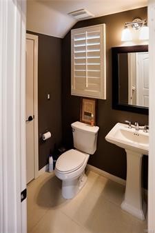 2963 Walking Beam Place Brea, CA 92821 - Photo 7 of 25 a bathroom with a sink toilet and mirror