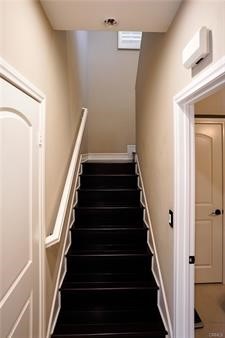 2963 Walking Beam Place Brea, CA 92821 - Photo 8 of 25 a view of staircase with wooden floor and white walls