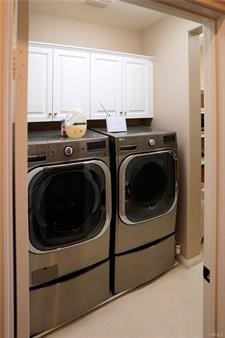 2963 Walking Beam Place Brea, CA 92821 - Photo 10 of 25 a utility room with dryer and washer