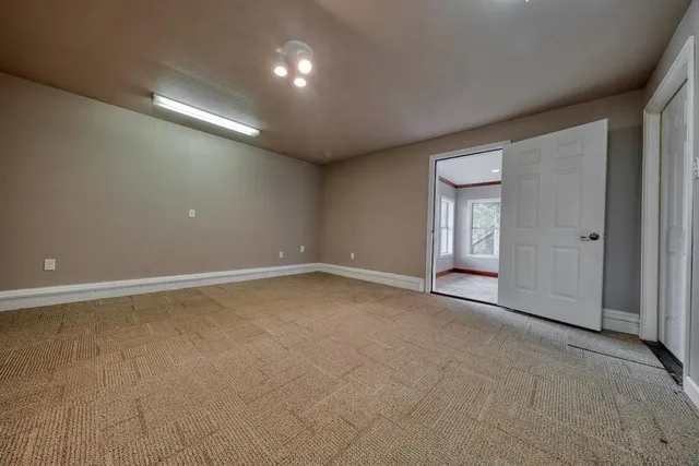 wooden floor and windows in an empty room