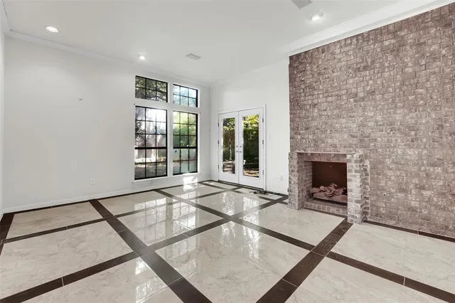 a living room with a fireplace