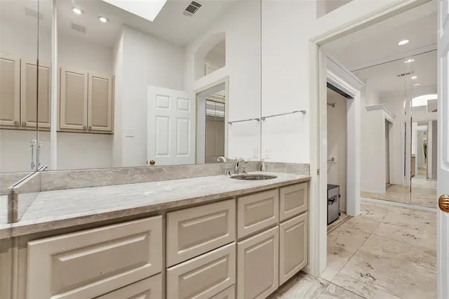 a bathroom with a bathtub and shower