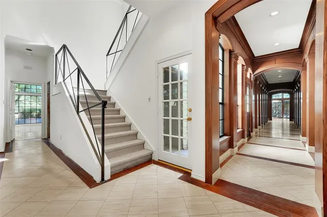 a view of a hallway with staircase