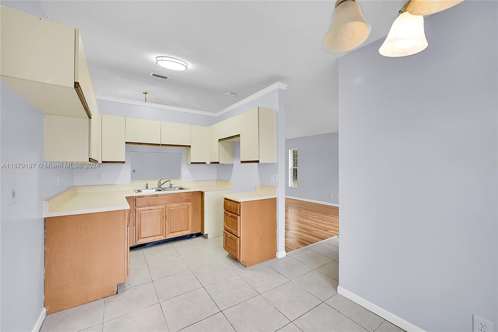 Greater Boynton Place Boynton Beach, FL 33437 - Photo 13 of 30 a large kitchen with a cabinets and counter space