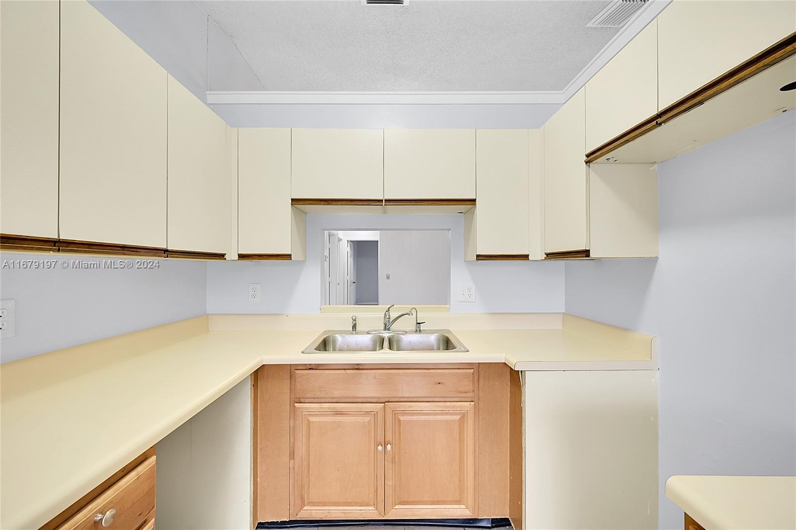 Greater Boynton Place Boynton Beach, FL 33437 - Photo 14 of 30 a room with a sink cabinets and utility