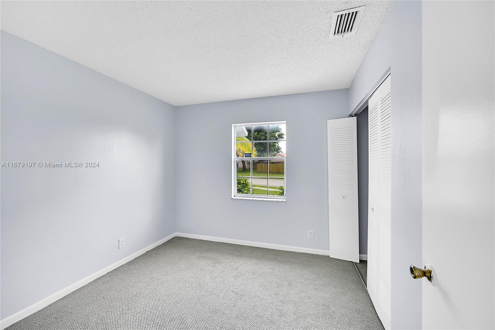 Greater Boynton Place Boynton Beach, FL 33437 - Photo 15 of 30 a view of an empty room with a window