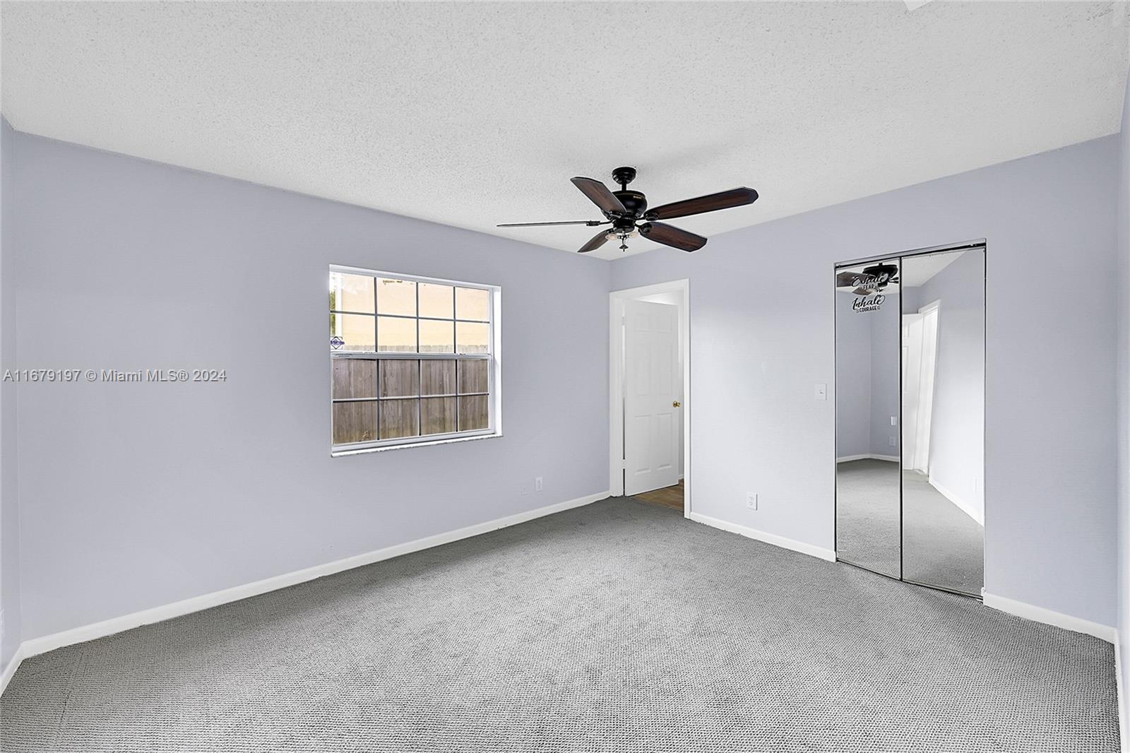 Greater Boynton Place Boynton Beach, FL 33437 - Photo 16 of 30 a view of an empty room with a window