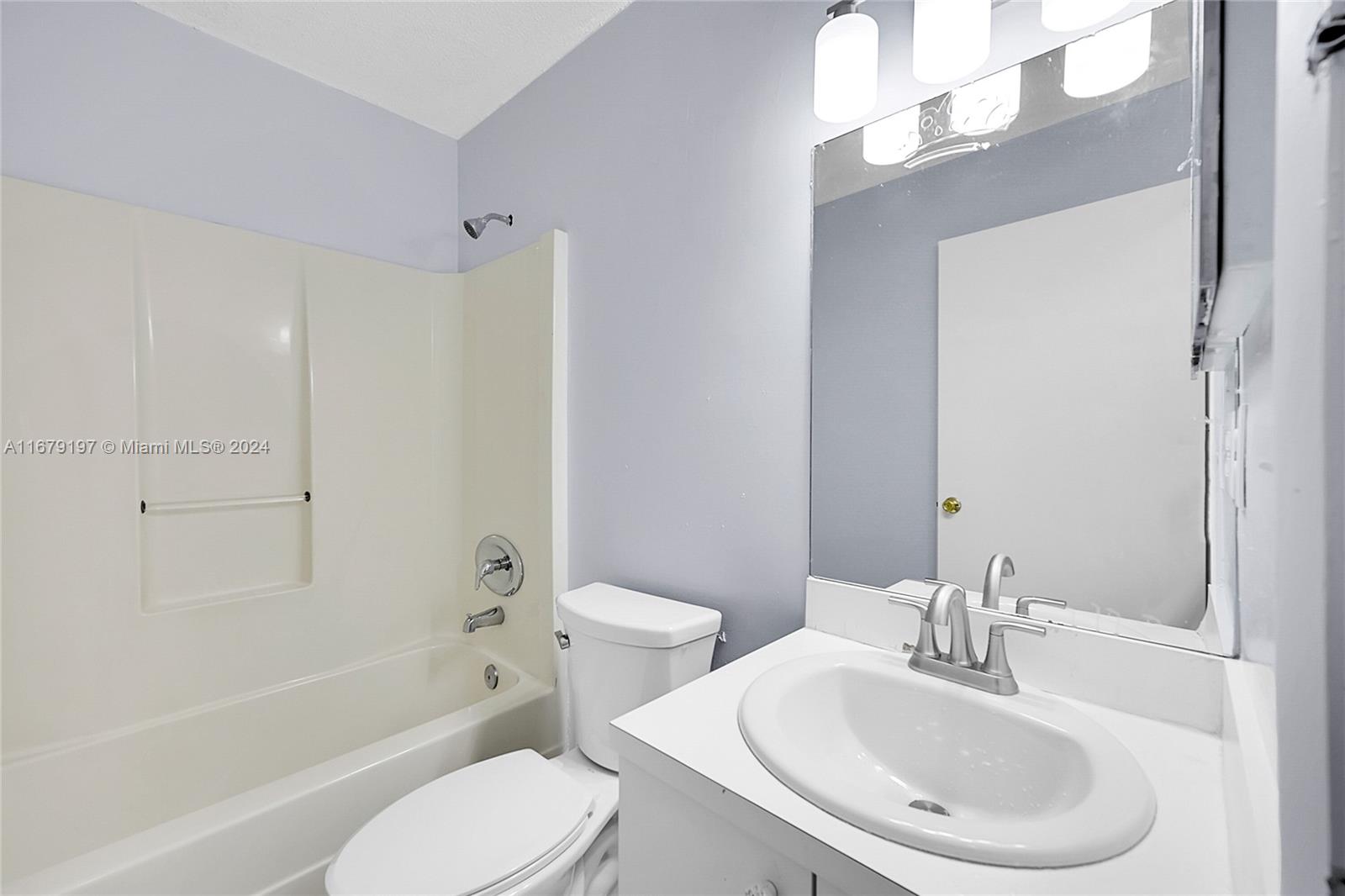 Greater Boynton Place Boynton Beach, FL 33437 - Photo 18 of 30 a bathroom with a sink toilet and shower