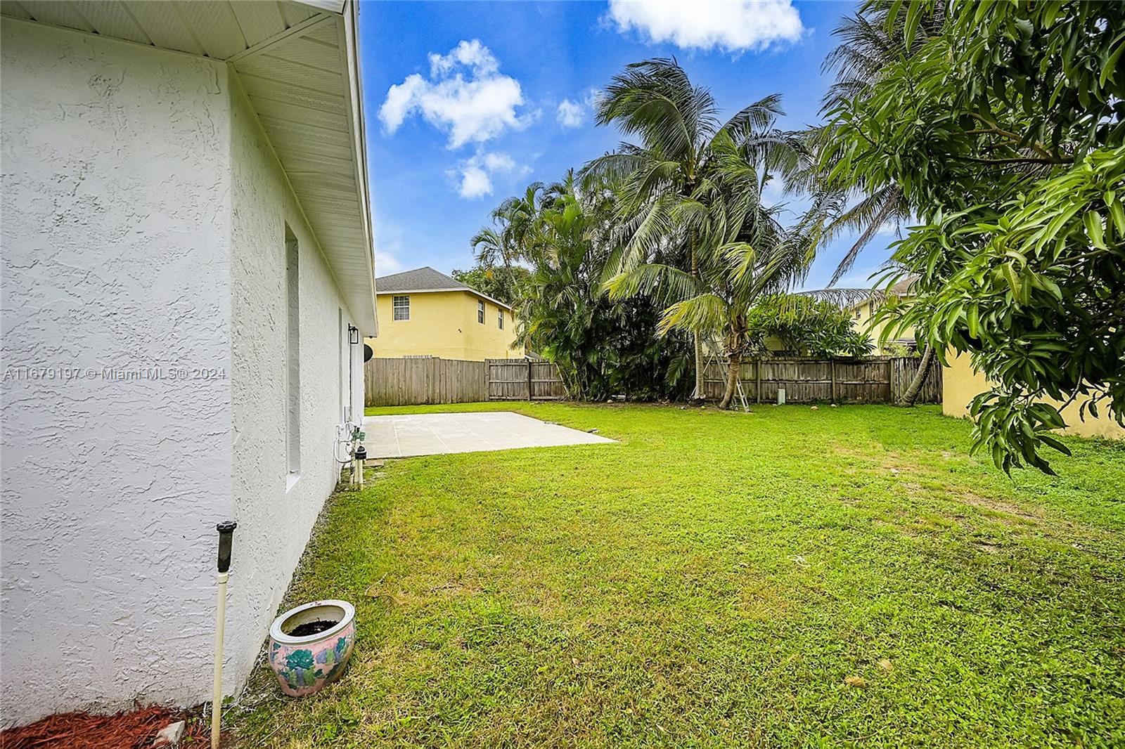Greater Boynton Place Boynton Beach, FL 33437 - Photo 27 of 30 a view of a yard with a house