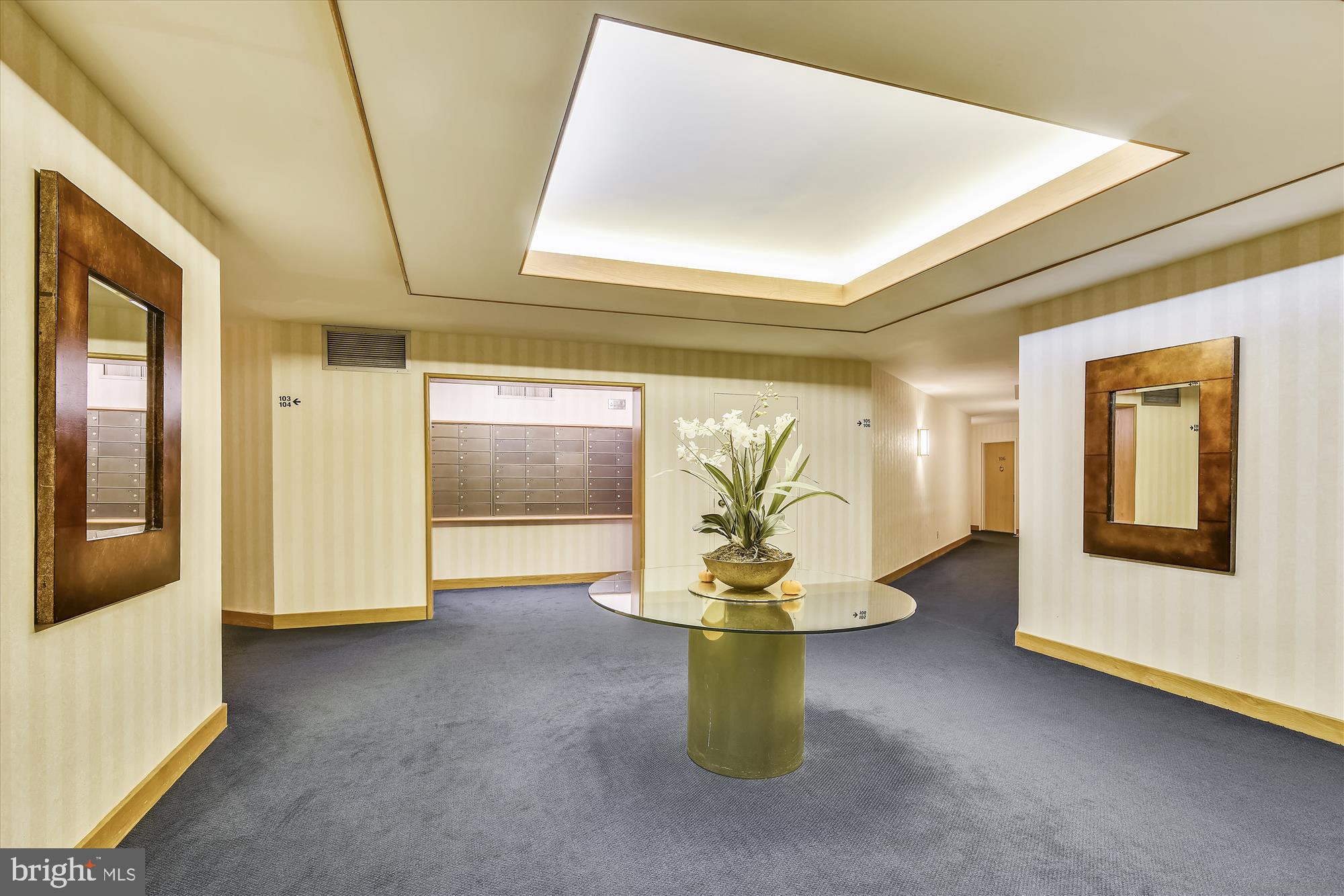 11500 Fairway Drive, Unit 102 Reston, VA 20190 - Photo 5 of 38 Formal lobby with mail boxes to the rear.