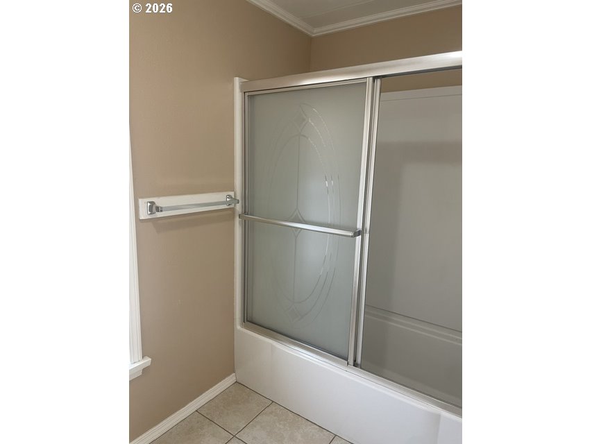 5660 Daisy Street, Unit 31 Springfield, OR 97478 - Photo 26 of 44 a bathroom with a glass shower door