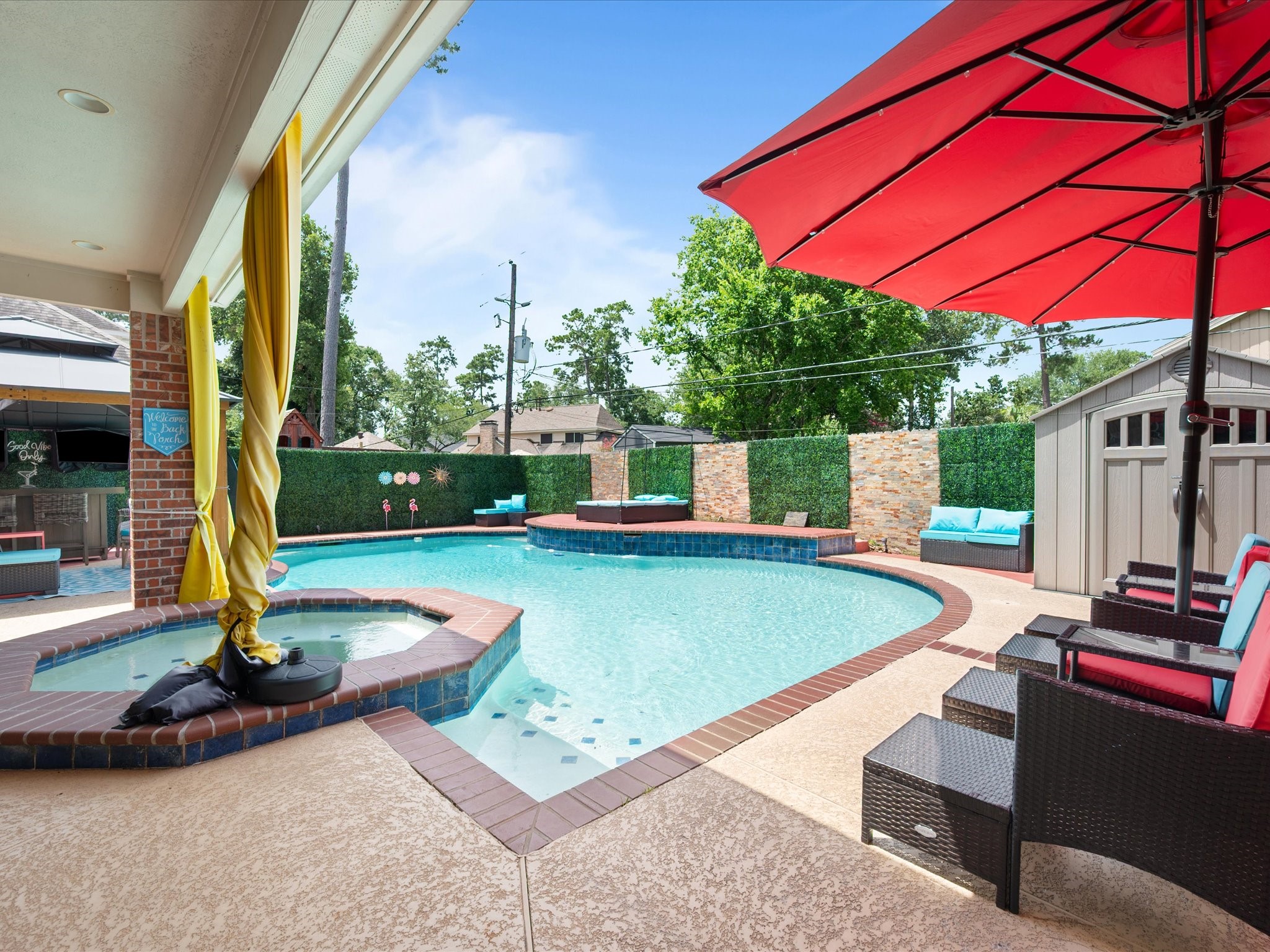 16123 Lafone Drive Spring, TX 77379 - Photo 35 of 47 A covered patio overlooking the pool provides the perfect setting to enjoy morning coffee, alfresco dining, or peaceful evenings outdoors.