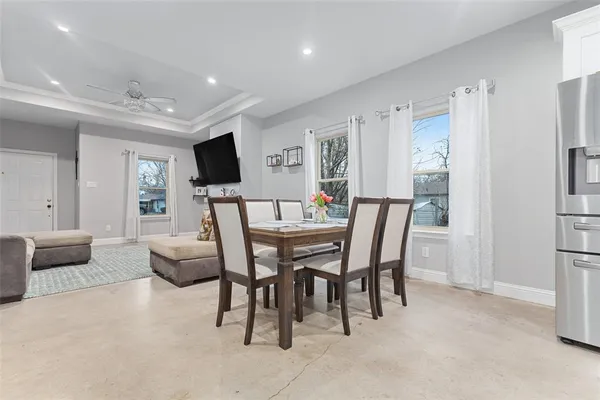 a view of a dining room with furniture