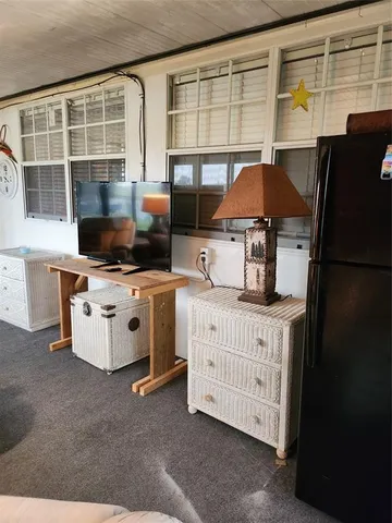 a kitchen with stainless steel appliances a stove and a refrigerator