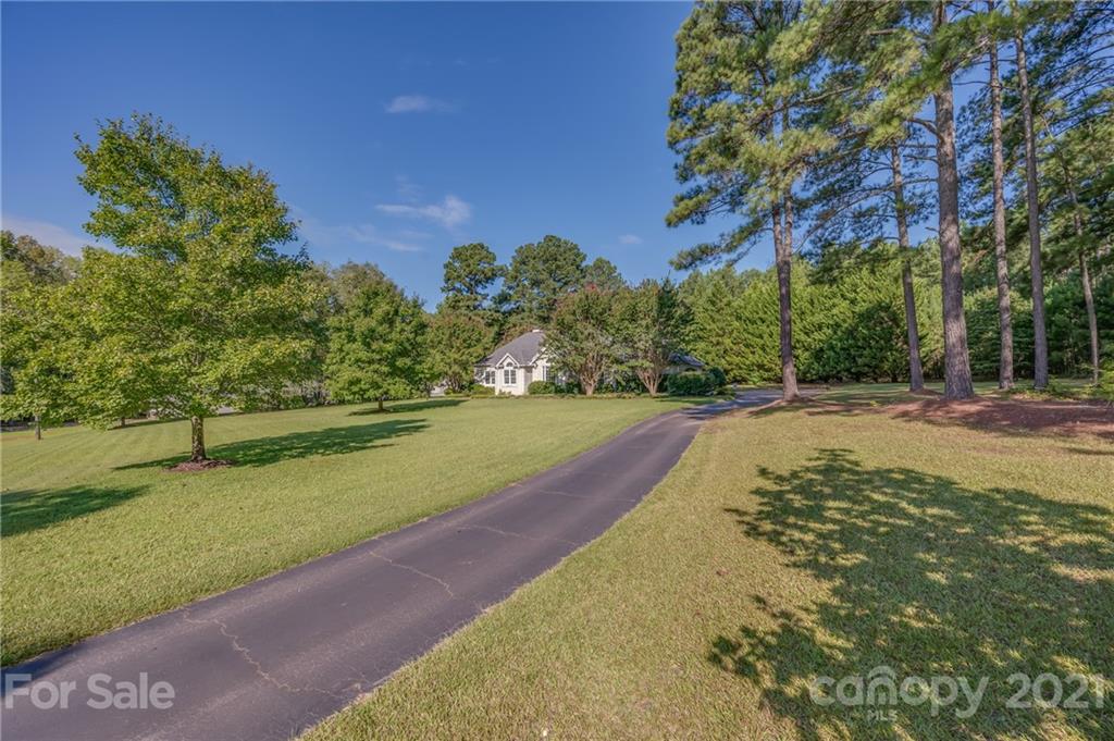 120 Pleasant Hill Road Landrum, SC 29356 - Photo 2 of 25 a view of a park with large trees