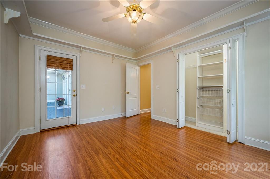 120 Pleasant Hill Road Landrum, SC 29356 - Photo 18 of 25 a view of an empty room with wooden floor