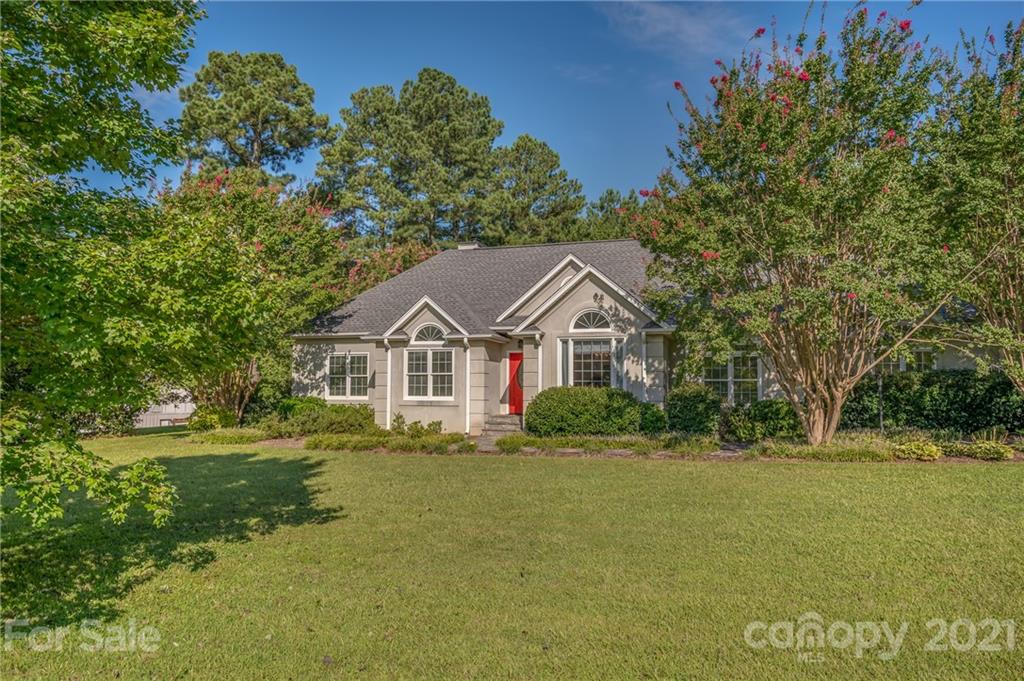 120 Pleasant Hill Road Landrum, SC 29356 - Photo 3 of 25 a front view of a house with a yard
