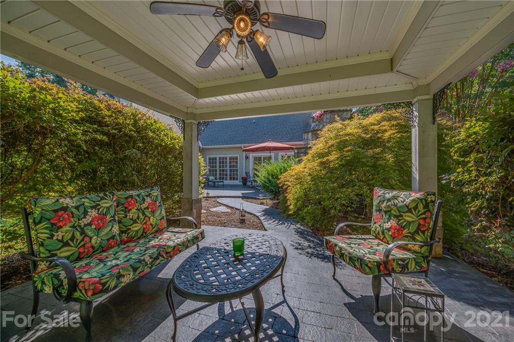 120 Pleasant Hill Road Landrum, SC 29356 - Photo 24 of 25 a outdoor living space with furniture and a potted plant