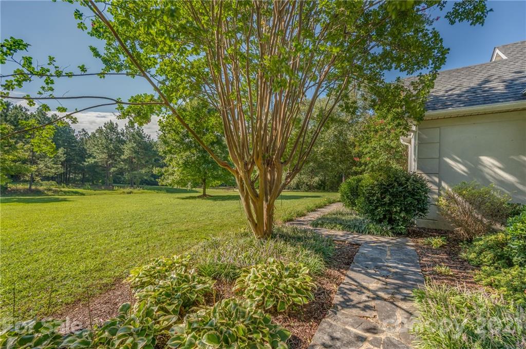 120 Pleasant Hill Road Landrum, SC 29356 - Photo 6 of 25 a view of a yard with a house