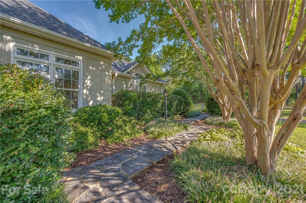 120 Pleasant Hill Road Landrum, SC 29356 - Photo 7 of 25 a view of a garden with plants