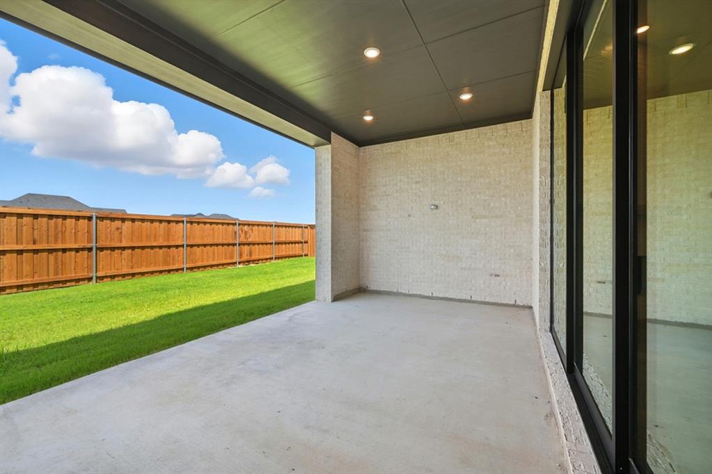 4013 Trellis Drive Prosper, TX 75078 - Photo 26 of 35 a view of a room with a big yard and potted plants