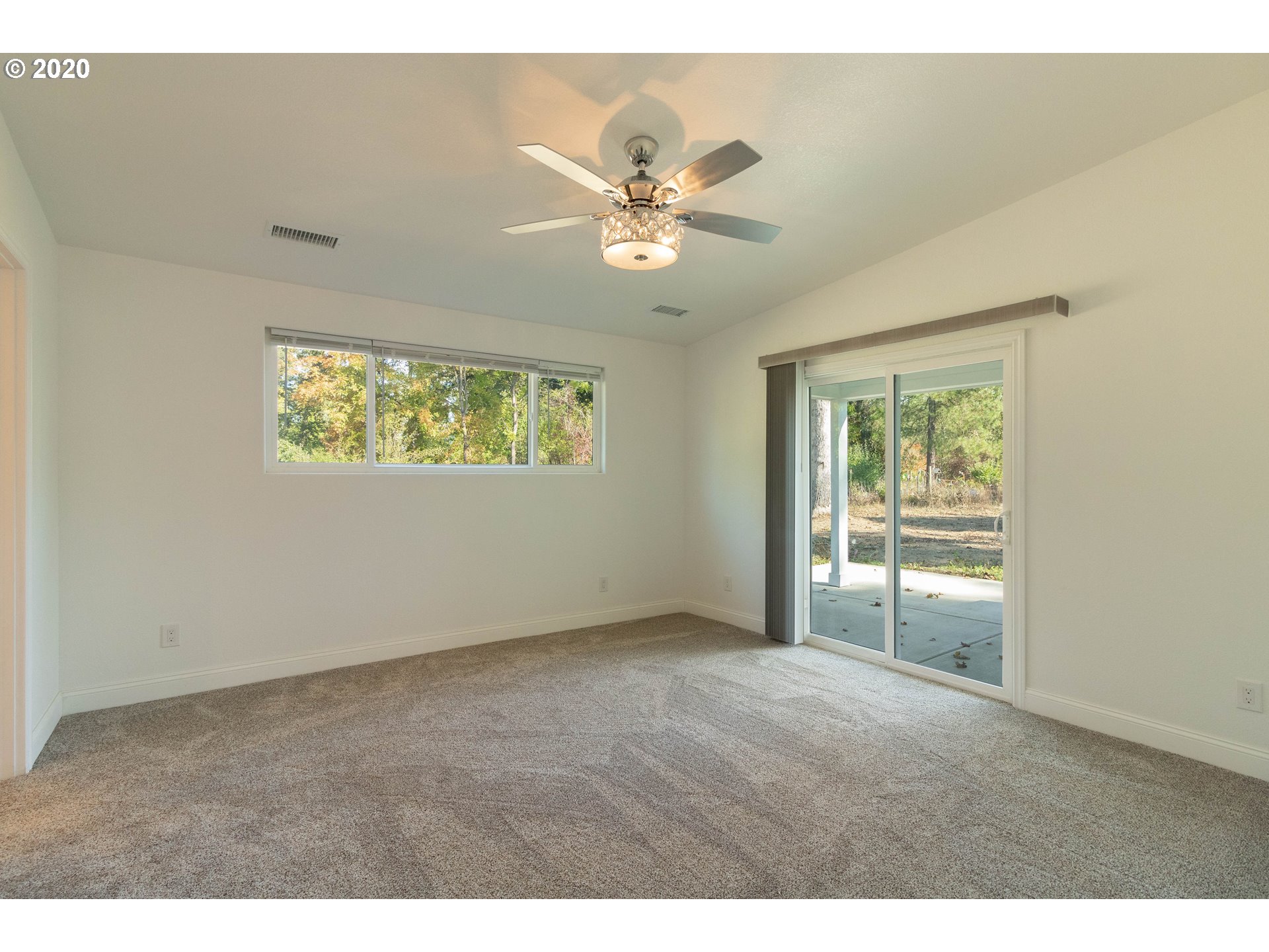 3373 Melrose Road Roseburg, OR 97471 - Photo 13 of 32 a view of an empty room with a window