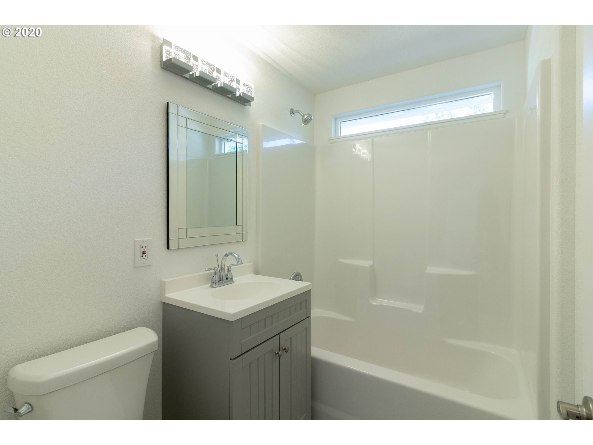 3373 Melrose Road Roseburg, OR 97471 - Photo 17 of 32 a bathroom with a sink and a mirror