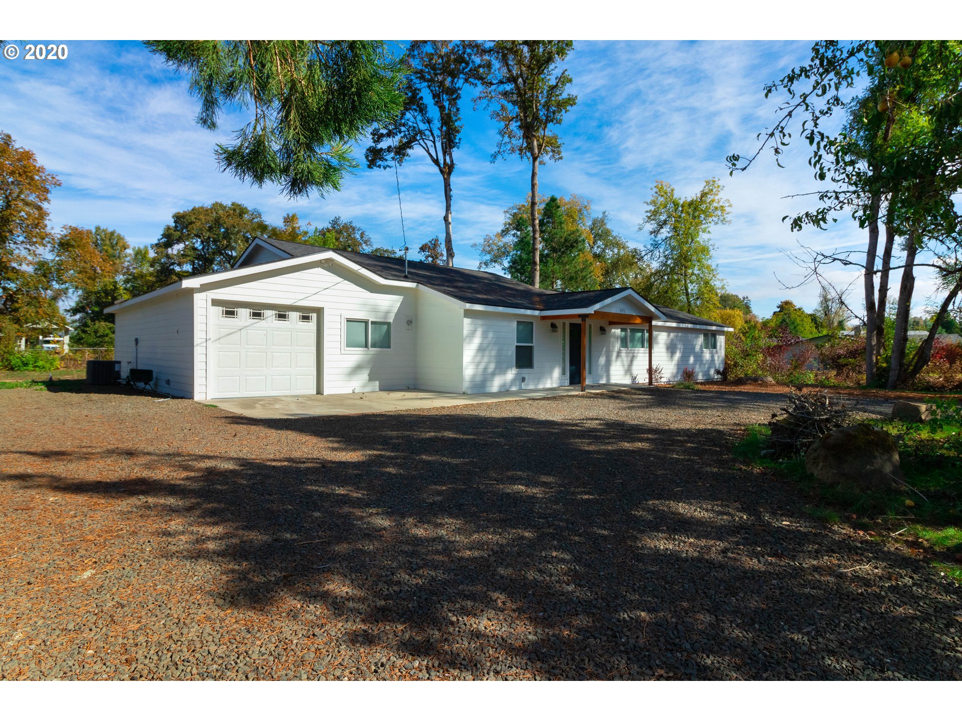3373 Melrose Road Roseburg, OR 97471 - Photo 2 of 32 a view of a house with a outdoor space