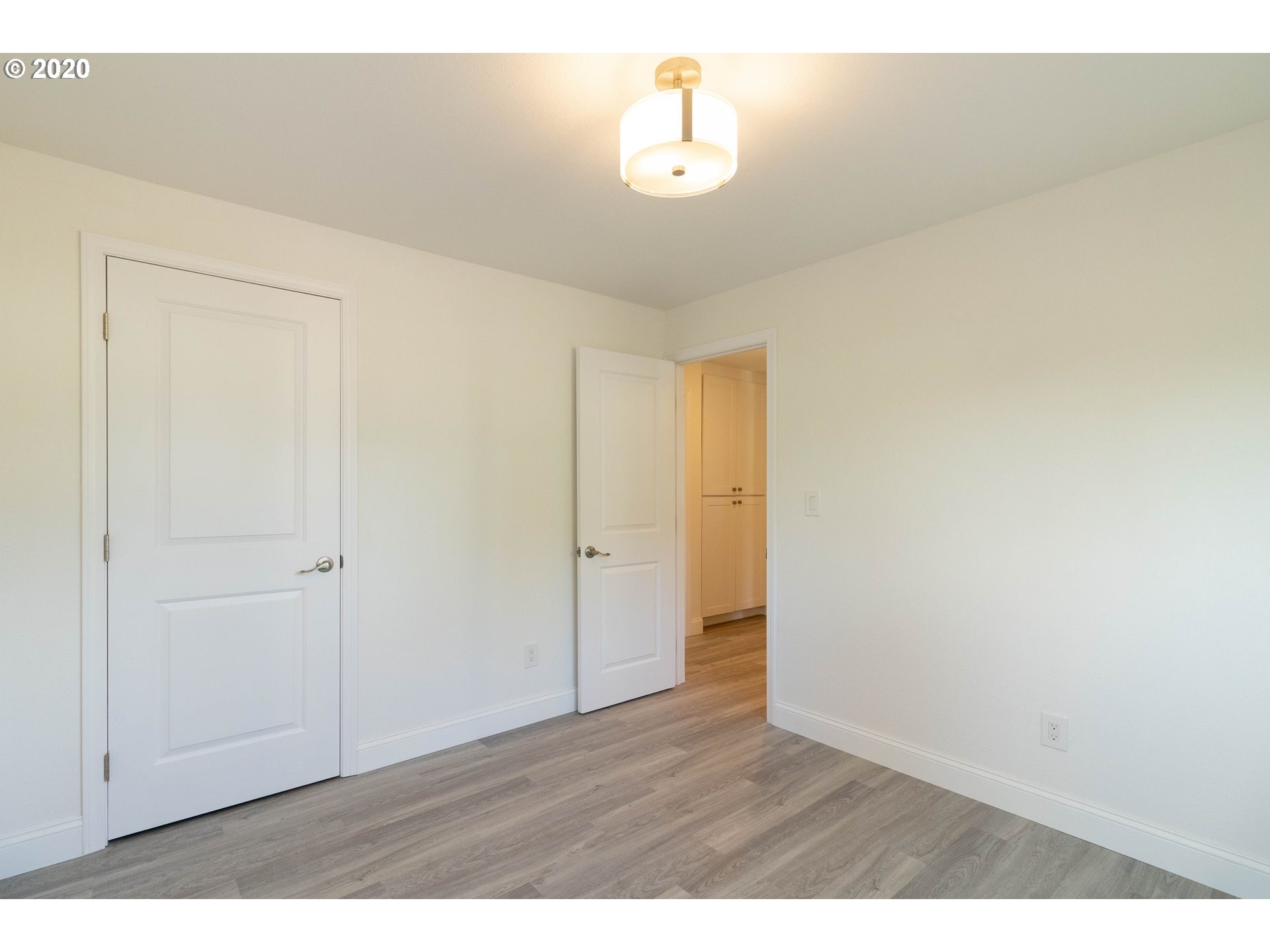 3373 Melrose Road Roseburg, OR 97471 - Photo 21 of 32 a view of empty room with wooden floor