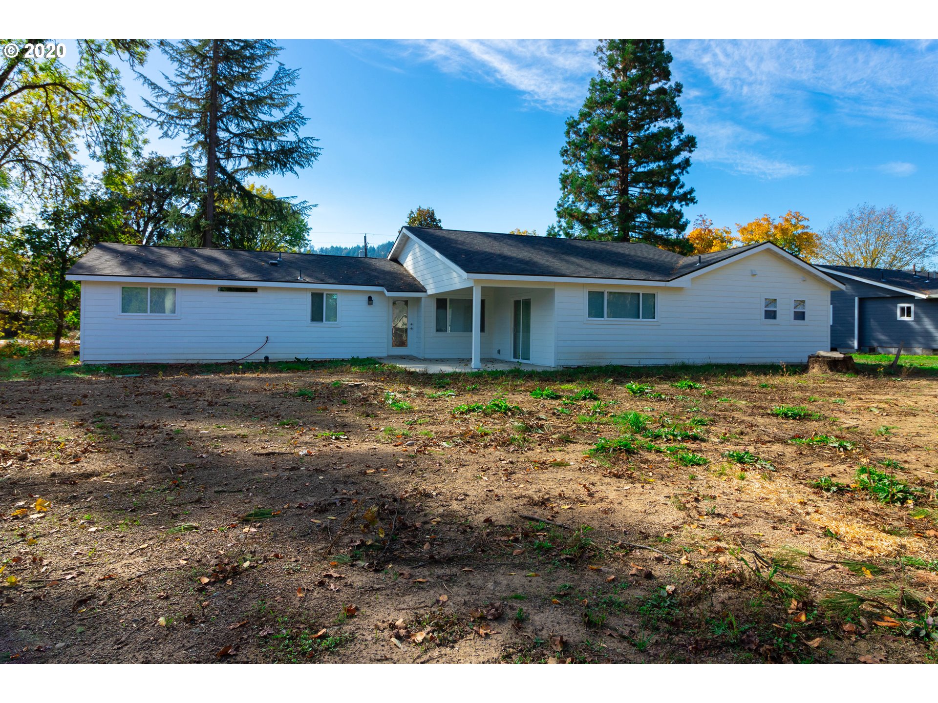 3373 Melrose Road Roseburg, OR 97471 - Photo 25 of 32 a view of a house with a garden