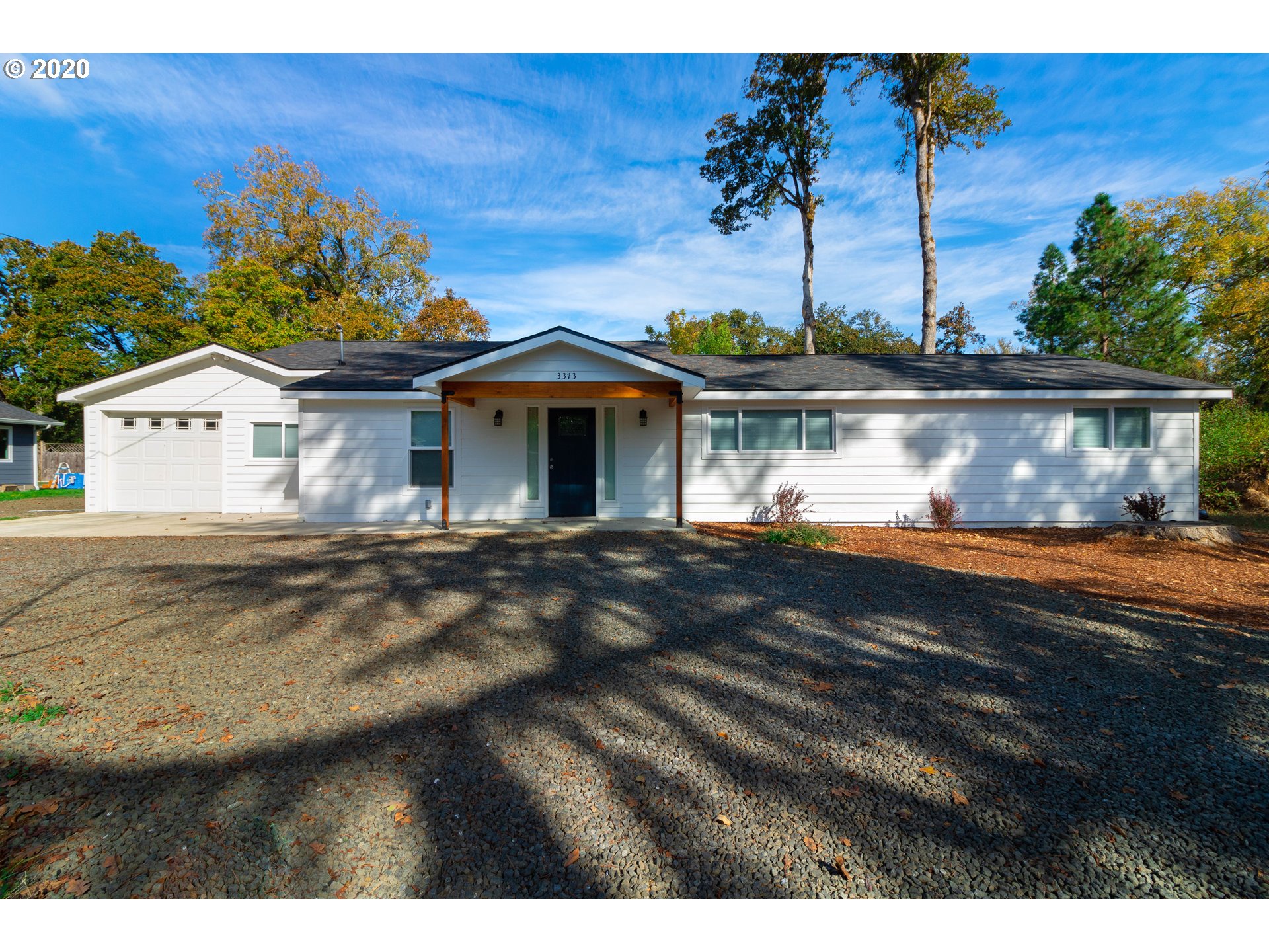 3373 Melrose Road Roseburg, OR 97471 - Photo 3 of 32 a view of a house with a yard
