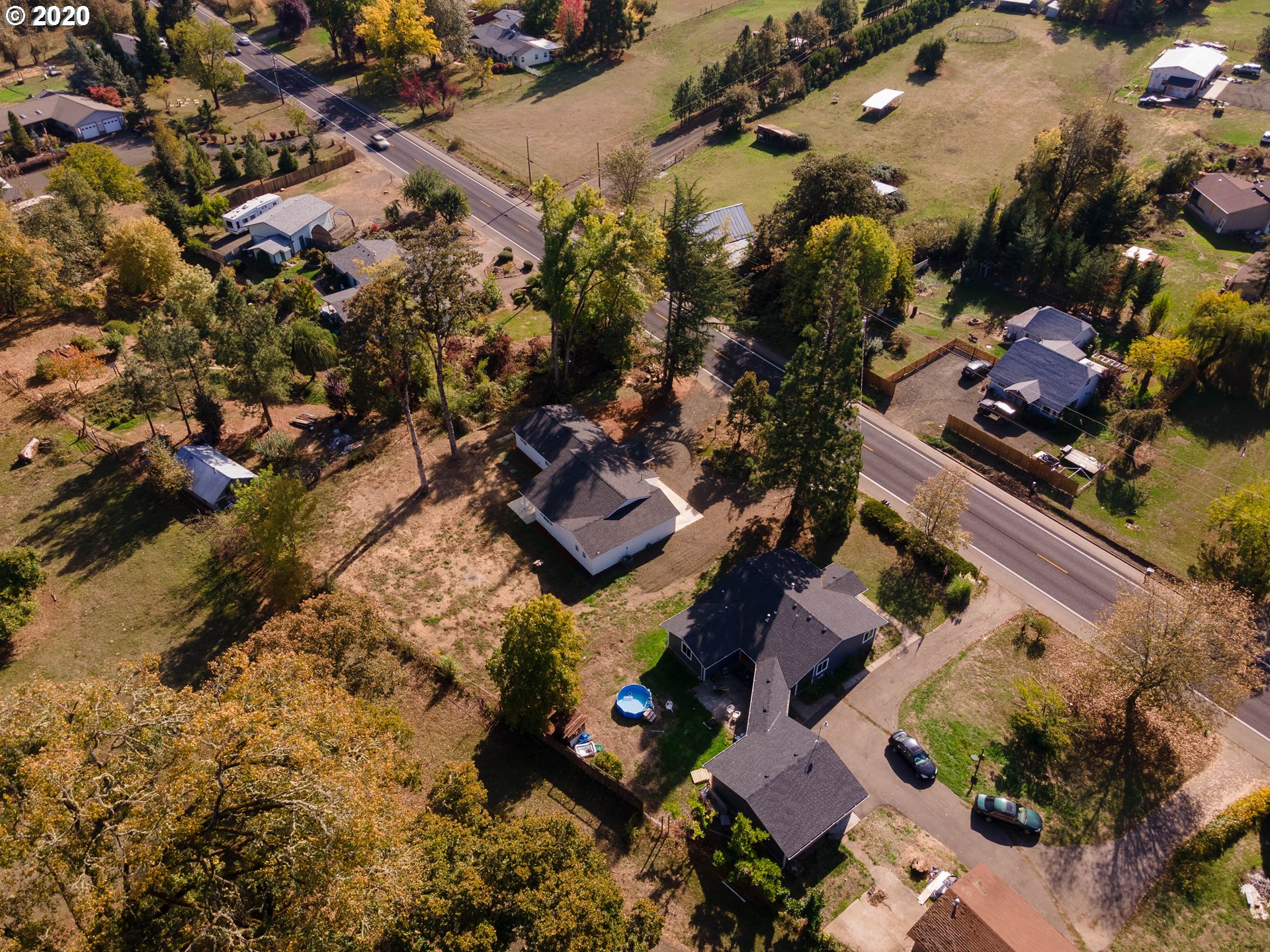 3373 Melrose Road Roseburg, OR 97471 - Photo 31 of 32 an aerial view of residential houses with outdoor space