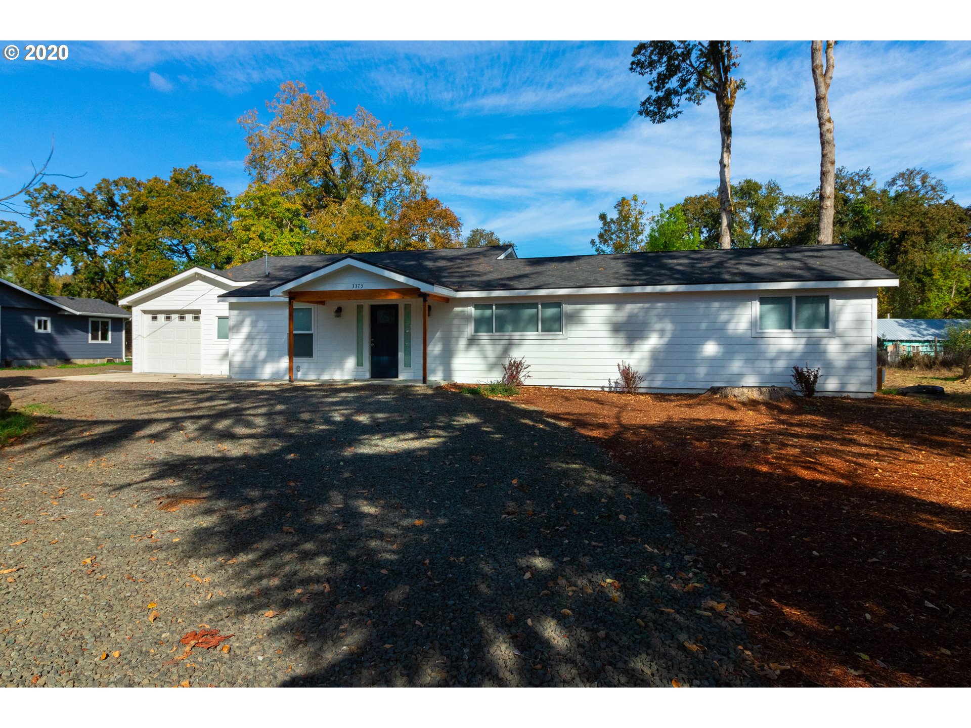 3373 Melrose Road Roseburg, OR 97471 - Photo 4 of 32 a front view of a house with a yard