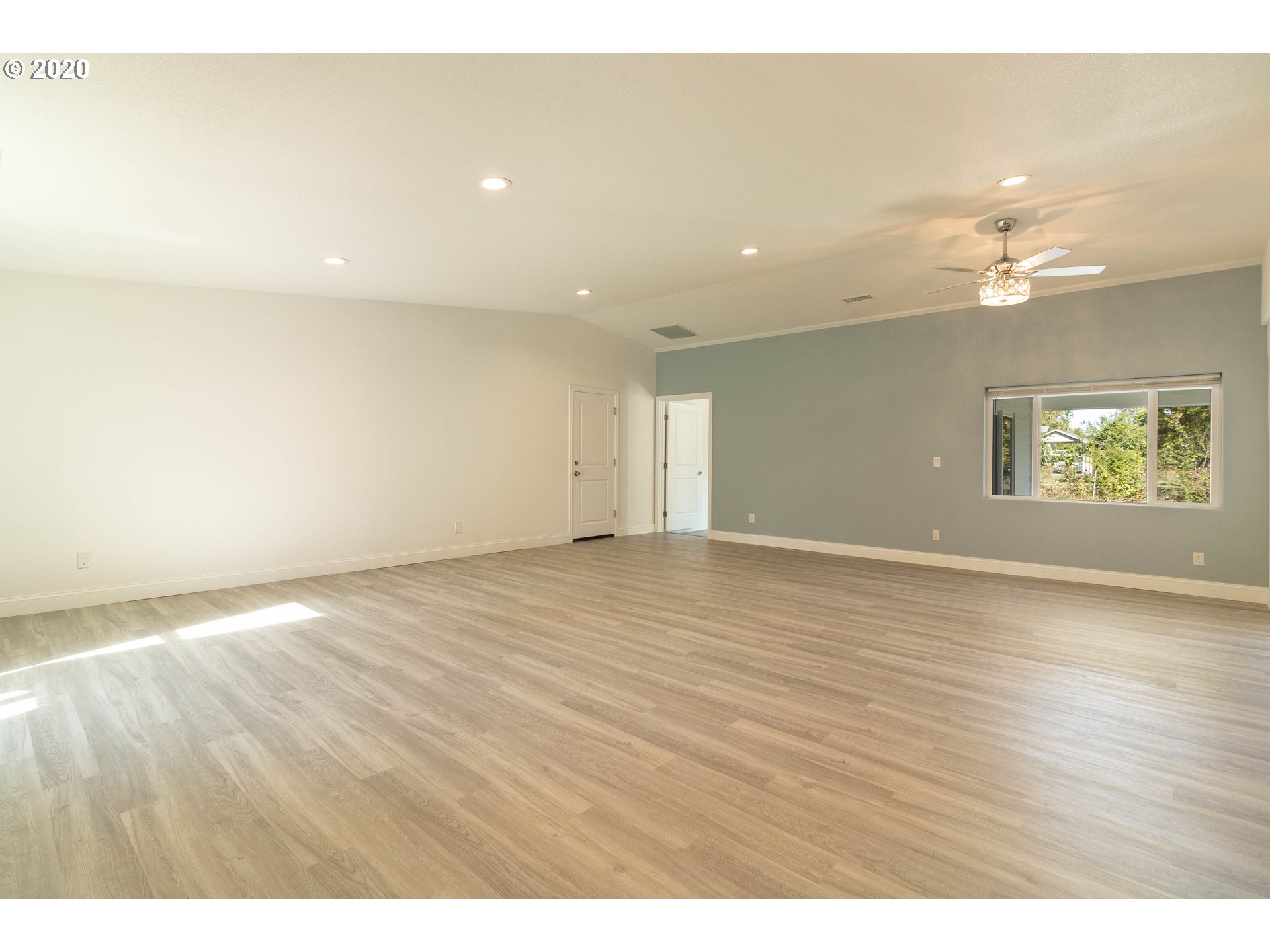 3373 Melrose Road Roseburg, OR 97471 - Photo 5 of 32 a view of an empty room and a window