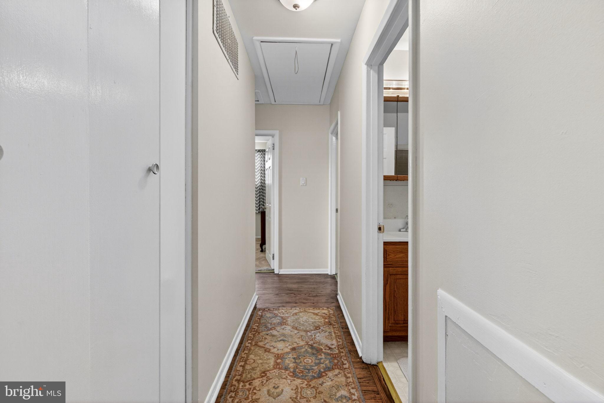 46 Trinity Avenue Marlton, NJ 08053 - Photo 12 of 37 a view of a hallway with wooden floor and staircase
