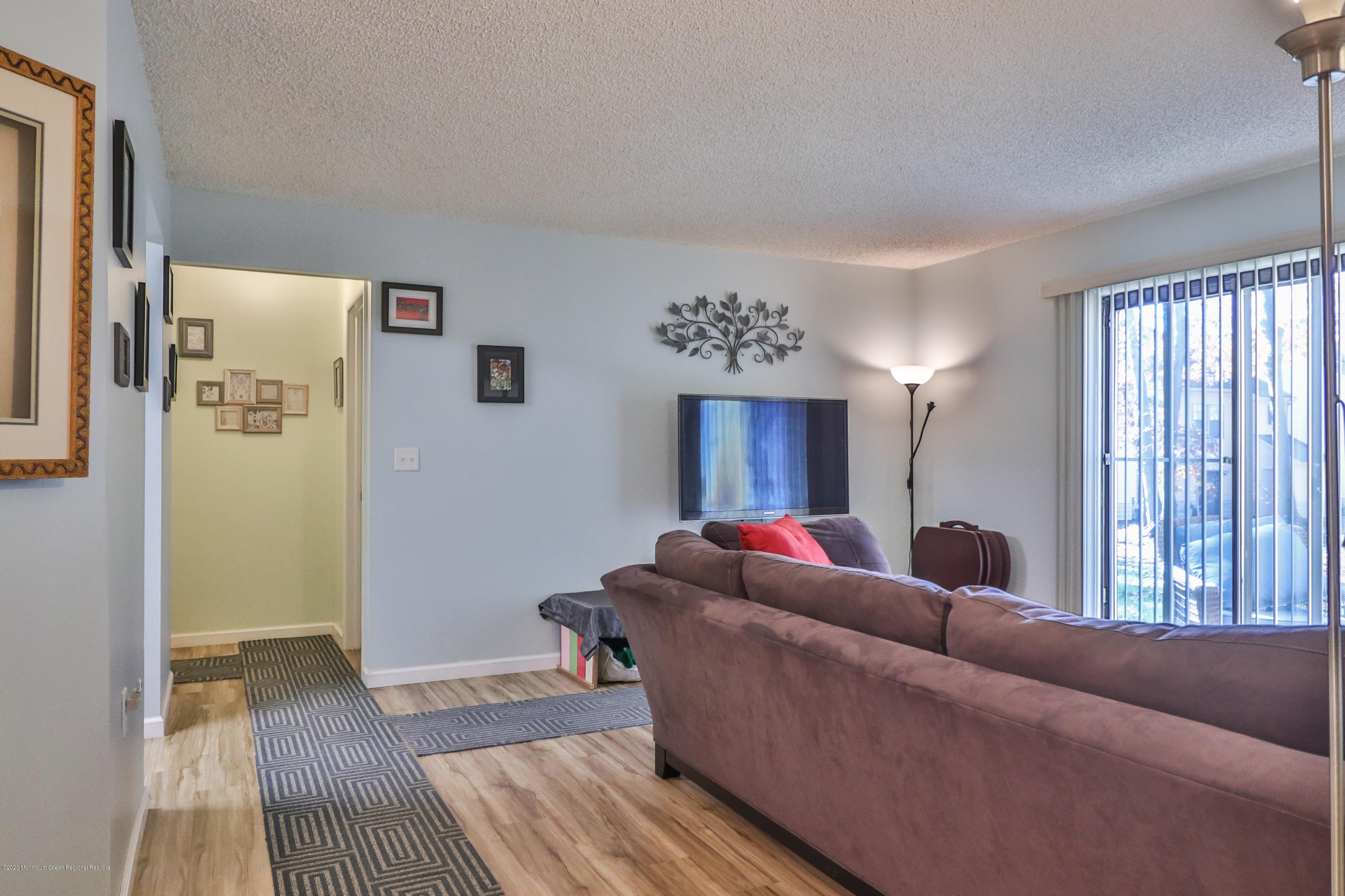 704 Violet Lane Jackson, NJ 08527 - Photo 1 of 20 a living room with furniture and a window