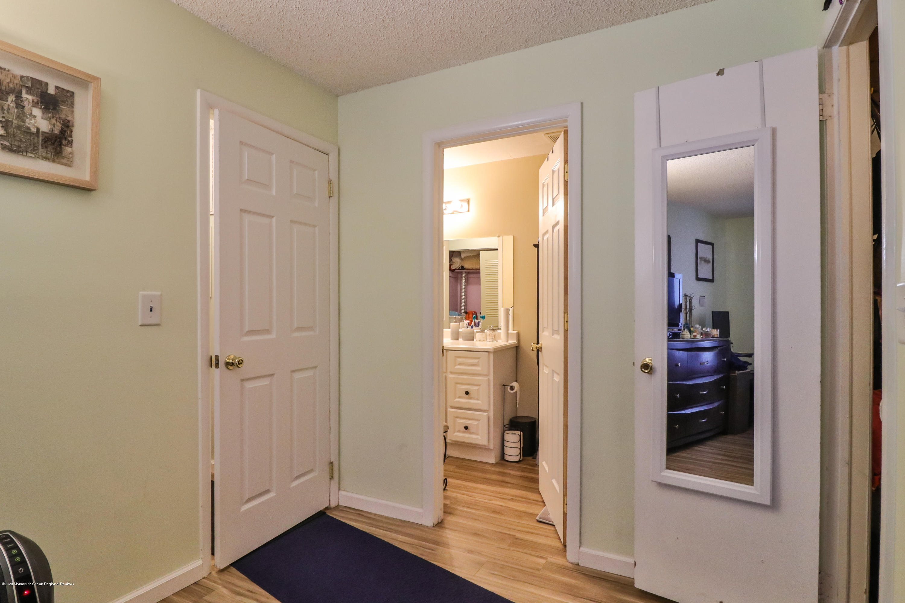 704 Violet Lane Jackson, NJ 08527 - Photo 11 of 20 a view of a bathroom from the hallway