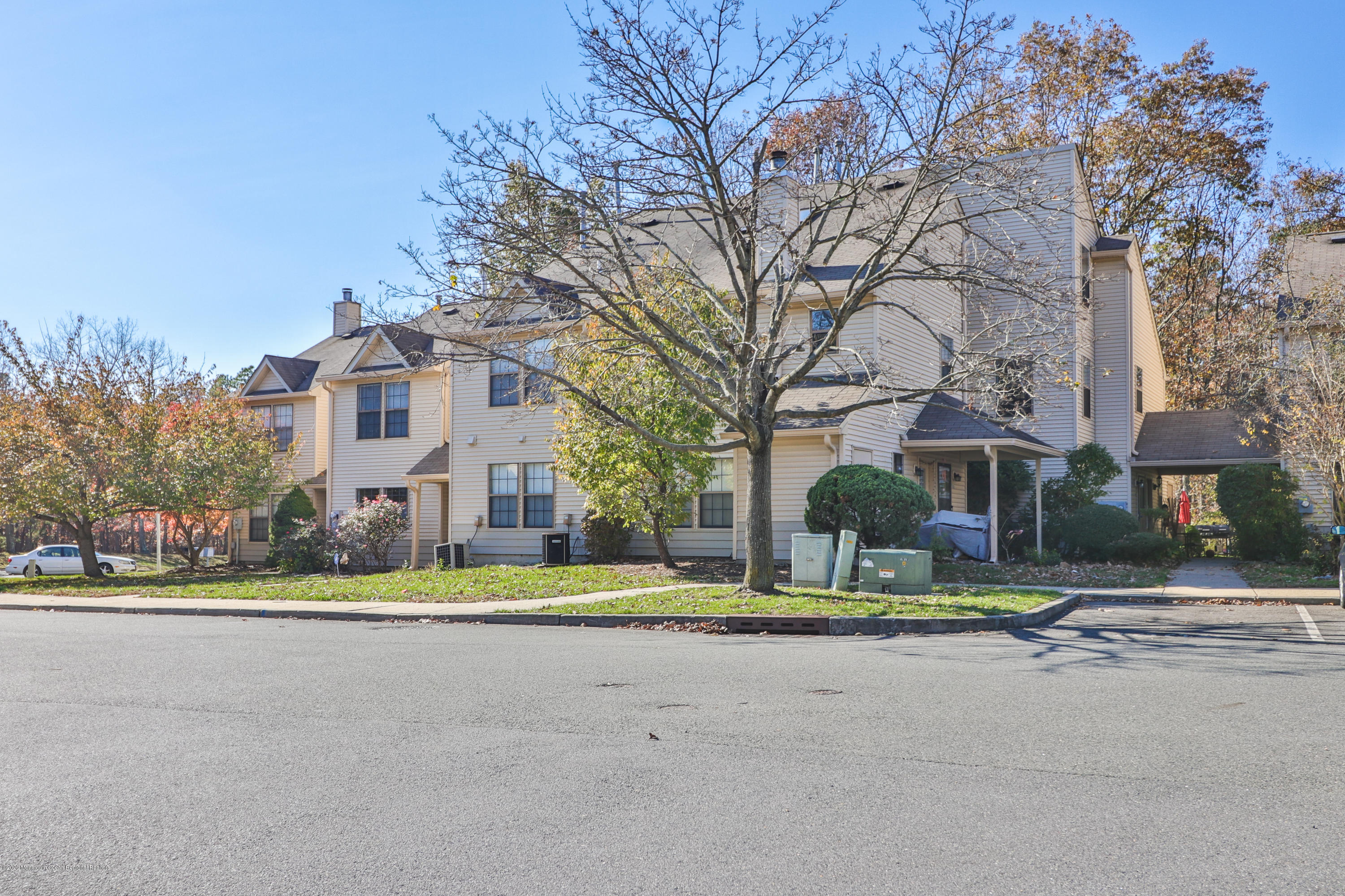 704 Violet Lane Jackson, NJ 08527 - Photo 18 of 20 a view of a building with a street