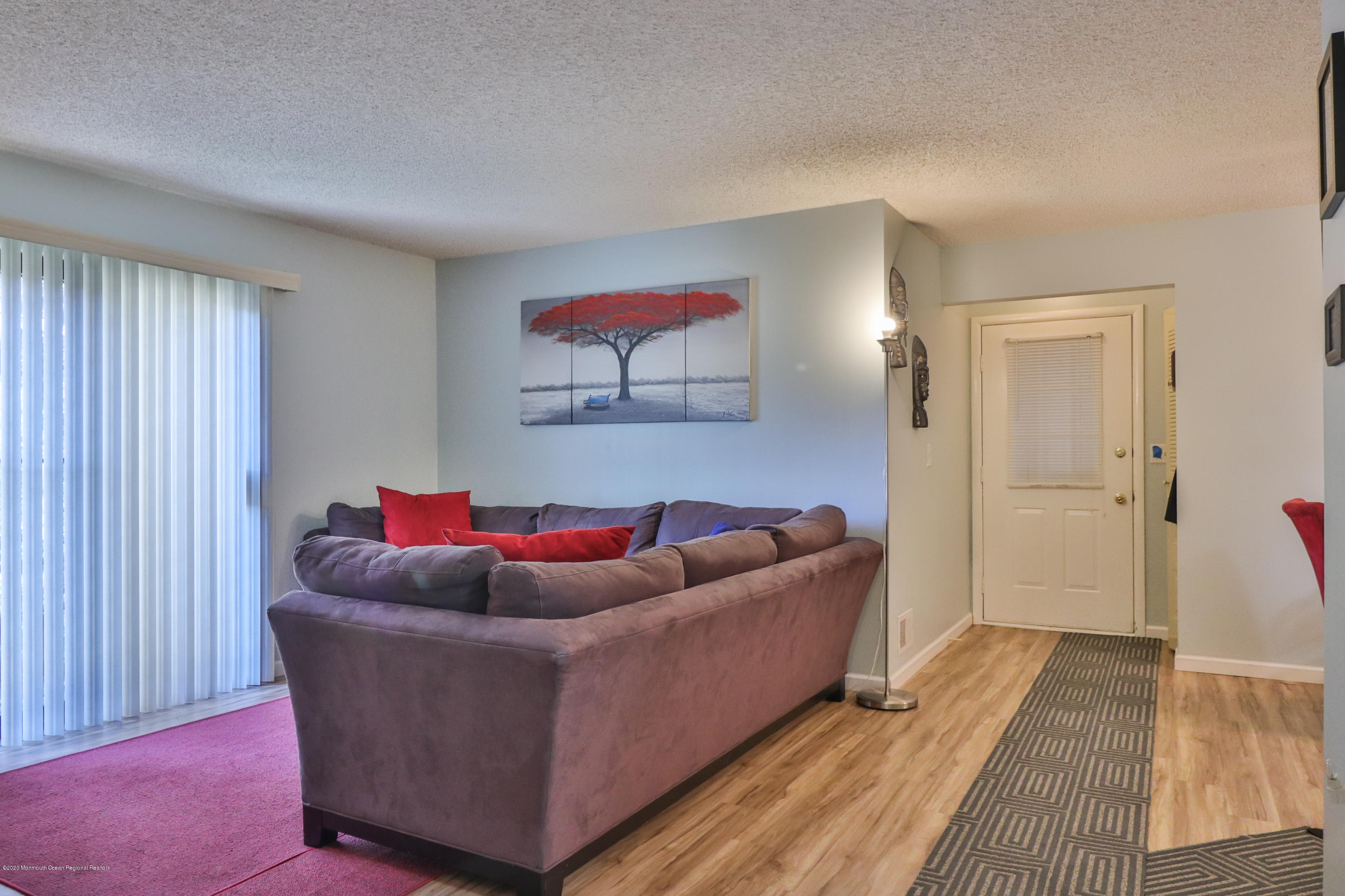 704 Violet Lane Jackson, NJ 08527 - Photo 3 of 20 a living room with furniture and a couch