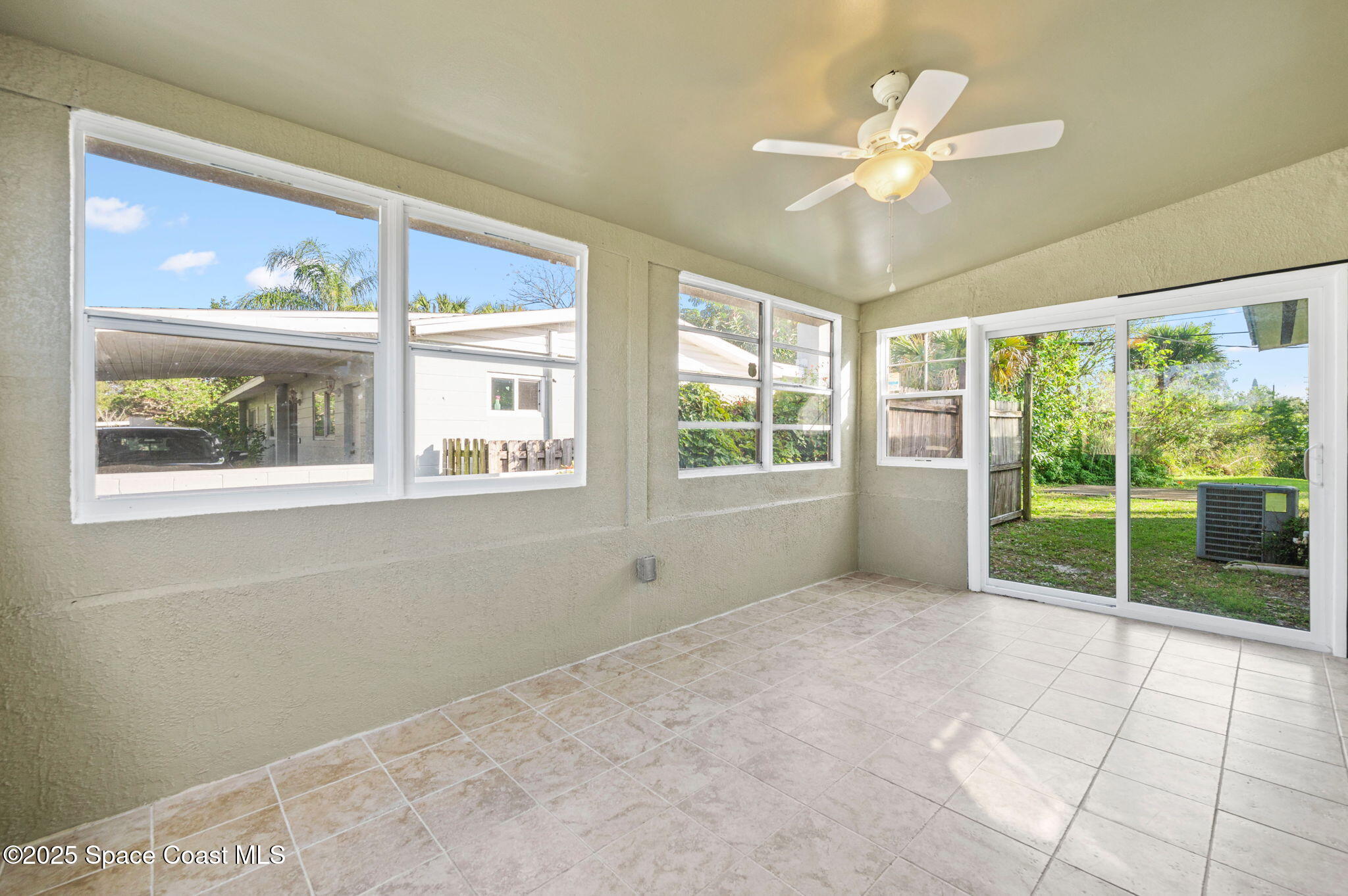 907 Espanola Way Melbourne, FL 32901 - Photo 20 of 31 a view of an empty room with a window