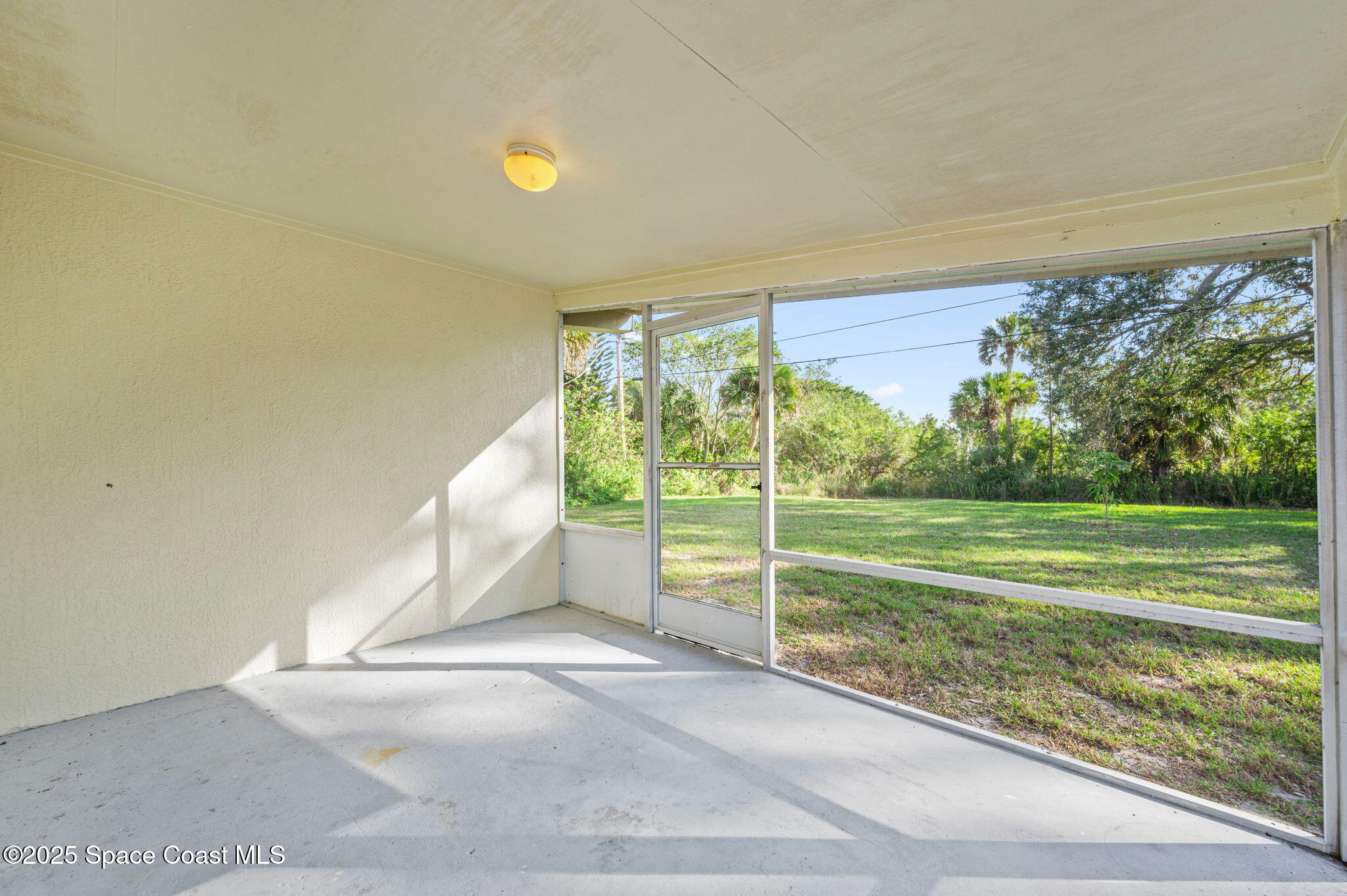 907 Espanola Way Melbourne, FL 32901 - Photo 27 of 31 back screen porch