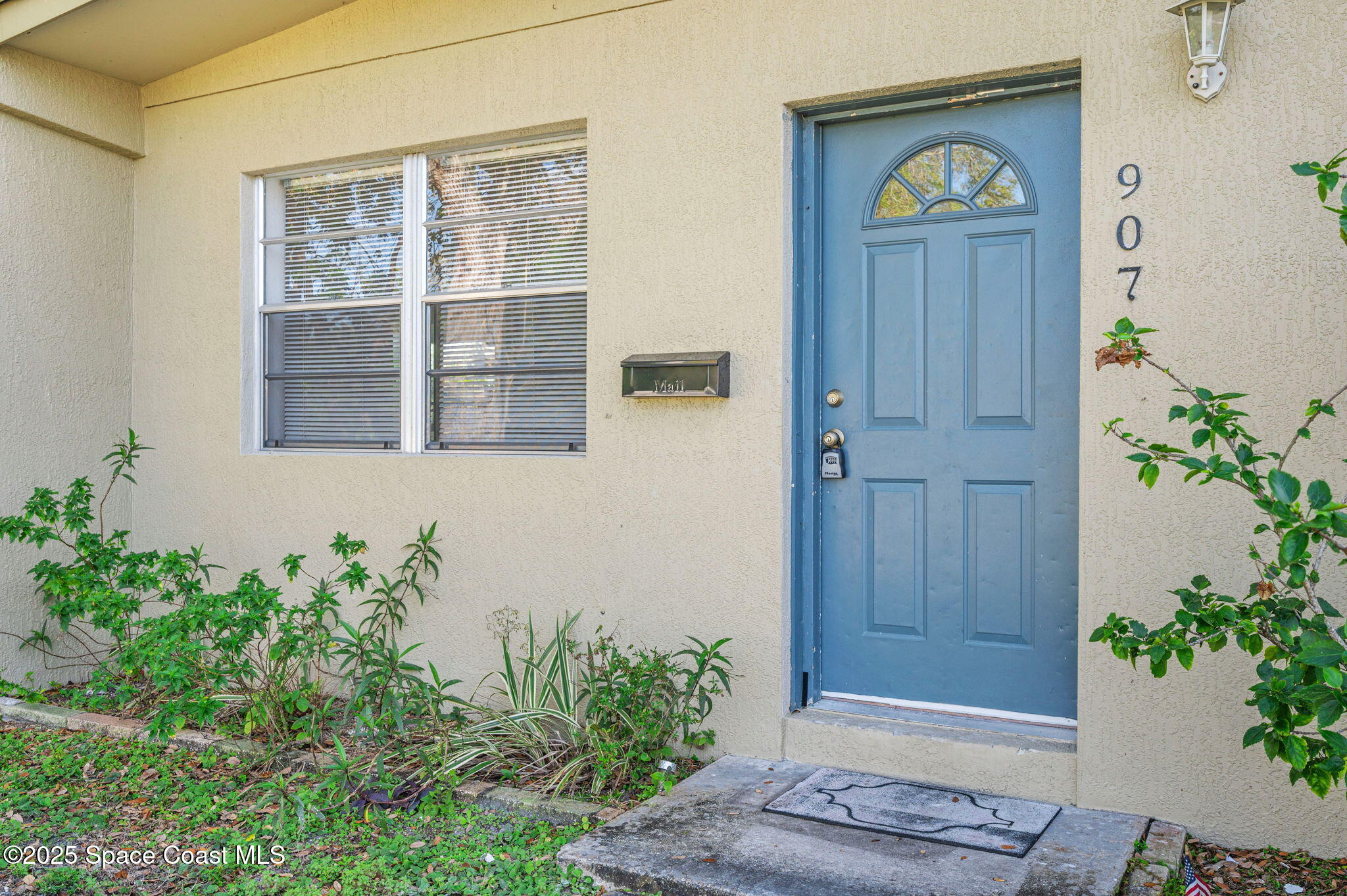 907 Espanola Way Melbourne, FL 32901 - Photo 3 of 31 a view of front door of house